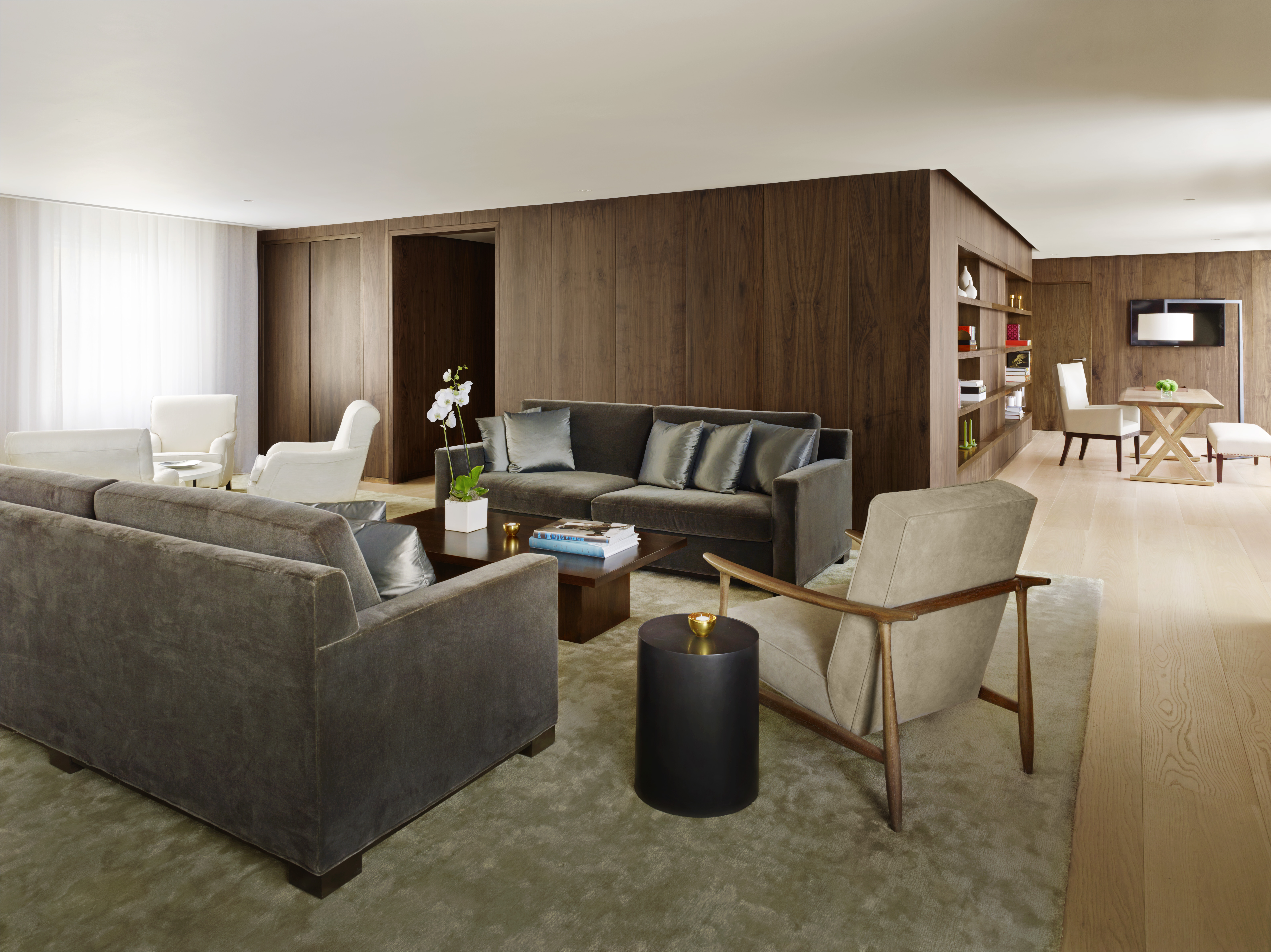 The Penthouse features separate living and dining areas, a pantry and library.